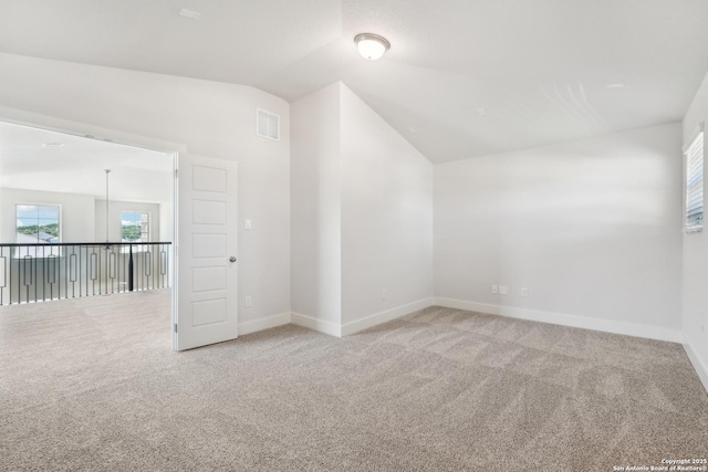 29508 Ringo Way, San Antonio, TX 78260 - additional living space with carpet floors, vaulted ceiling, healthy amount of natural light, and baseboards