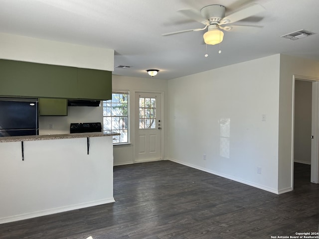 1807 Fresno, San Antonio, TX 78201 - kitchen with refrigerator, a ceiling fan, dark wood finished floors, and extractor fan