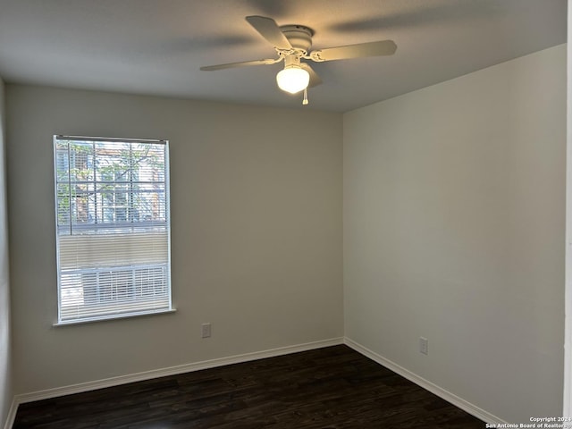 1807 Fresno, San Antonio, TX 78201 - spare room featuring dark wood-style floors, baseboards, and ceiling fan