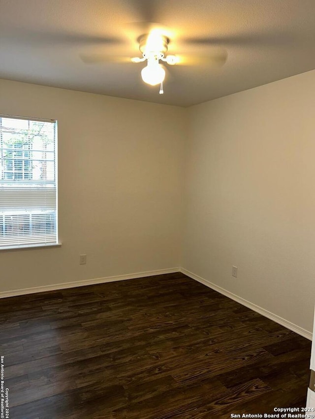 1807 Fresno, San Antonio, TX 78201 - empty room featuring dark wood-type flooring, ceiling fan, and baseboards