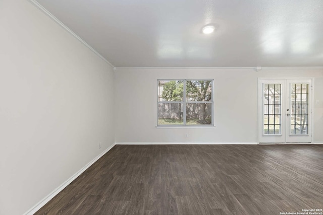 1011 Cat Mesa, San Antonio, TX 78251 - unfurnished room with dark wood-type flooring, crown molding, french doors, and baseboards