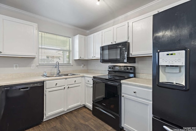 1011 Cat Mesa, San Antonio, TX 78251 - kitchen with black appliances, a sink, dark wood-style flooring, white cabinetry, and crown molding