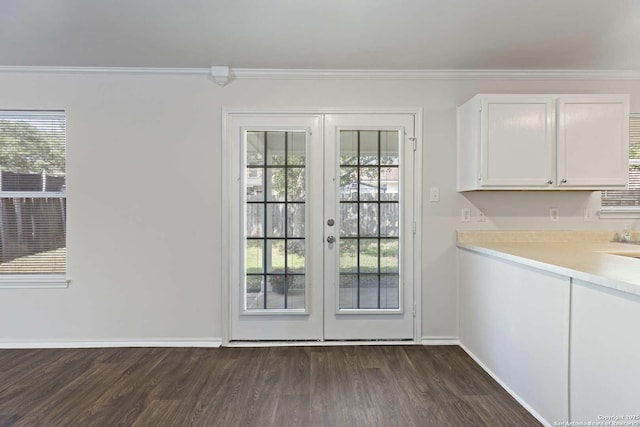 1011 Cat Mesa, San Antonio, TX 78251 - entryway with french doors, dark wood finished floors, healthy amount of natural light, crown molding, and baseboards