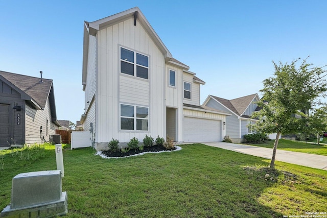 4538 Nueces, San Antonio, TX 78253 - view of front of property with board and batten siding, driveway, a front yard, and a garage