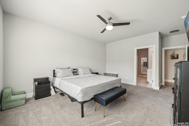4538 Nueces, San Antonio, TX 78253 - bedroom featuring light carpet, baseboards, ceiling fan, and connected bathroom