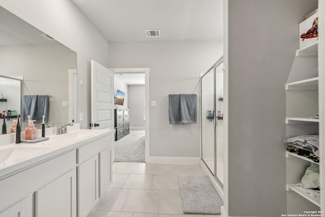 4538 Nueces, San Antonio, TX 78253 - bathroom with double vanity, a stall shower, and tile patterned flooring