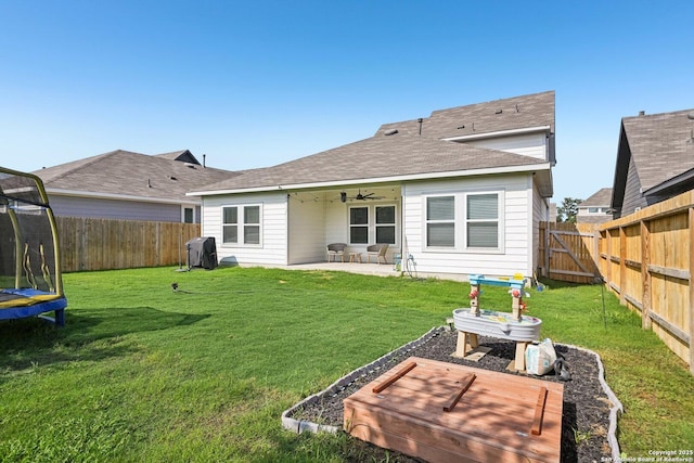 4538 Nueces, San Antonio, TX 78253 - back of house featuring a patio, a trampoline, ceiling fan, and a shingled roof