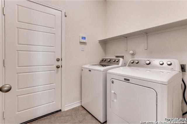 3951 Gentle Mdw, New Braunfels, TX 78130 - laundry room with independent washer and dryer and baseboards