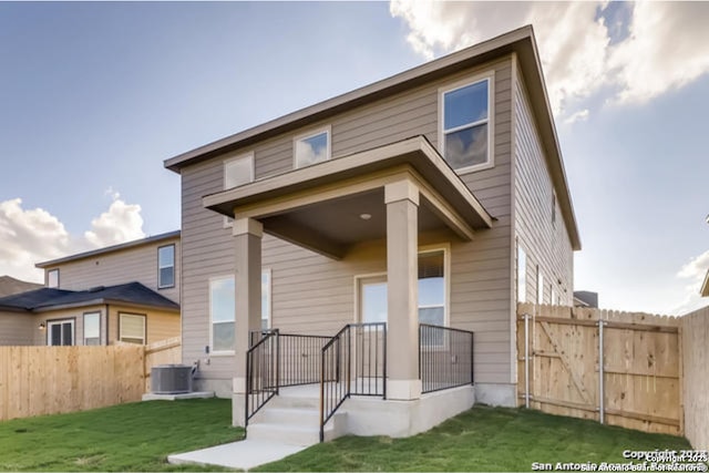 3951 Gentle Mdw, New Braunfels, TX 78130 - rear view of property featuring central AC unit and a gate
