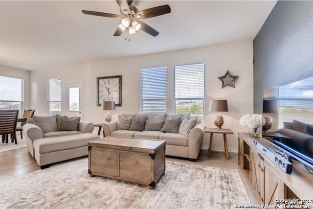 3951 Gentle Mdw, New Braunfels, TX 78130 - living room featuring healthy amount of natural light and a ceiling fan