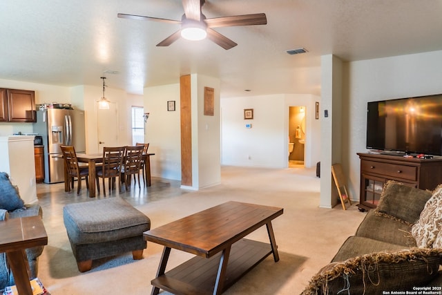 9930 Amber Breeze, San Antonio, TX 78245 - living room with ceiling fan and baseboards
