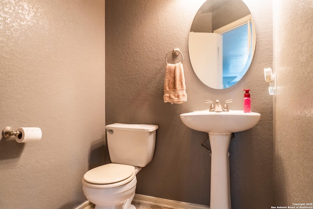 9930 Amber Breeze, San Antonio, TX 78245 - half bathroom featuring toilet