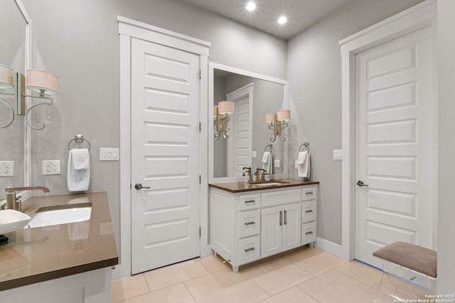 228 Cloverleaf, Alamo Heights, TX 78209 - bathroom featuring vanity, tile patterned flooring, and recessed lighting