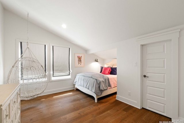 228 Cloverleaf, Alamo Heights, TX 78209 - bedroom with vaulted ceiling, wood finished floors, and baseboards