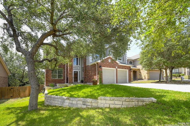 414 Aspen, San Antonio, TX 78253 - view of front of house featuring driveway, brick siding, and an attached garage
