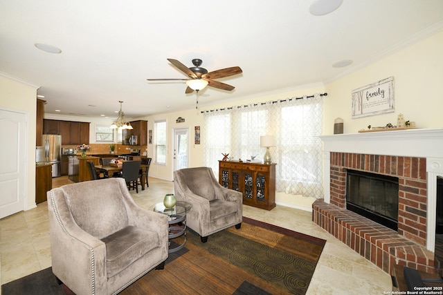 414 Aspen, San Antonio, TX 78253 - living room featuring ceiling fan, a brick fireplace, crown molding, light tile patterned floors, and a chandelier