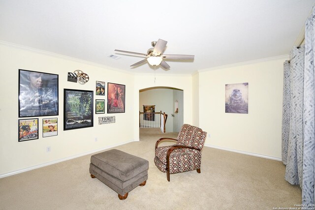 414 Aspen, San Antonio, TX 78253 - living area with carpet floors, ornamental molding, a ceiling fan, arched walkways, and baseboards