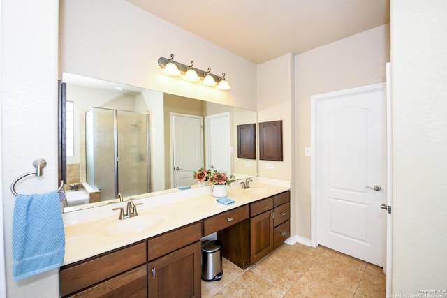 414 Aspen, San Antonio, TX 78253 - bathroom featuring double vanity, a shower stall, tile patterned flooring, and baseboards