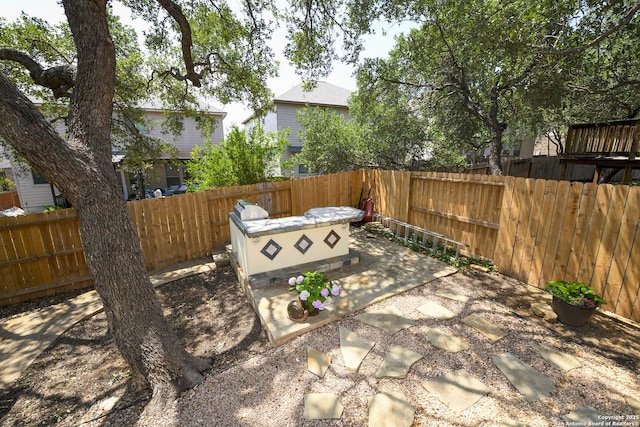 414 Aspen, San Antonio, TX 78253 - fenced backyard with a patio