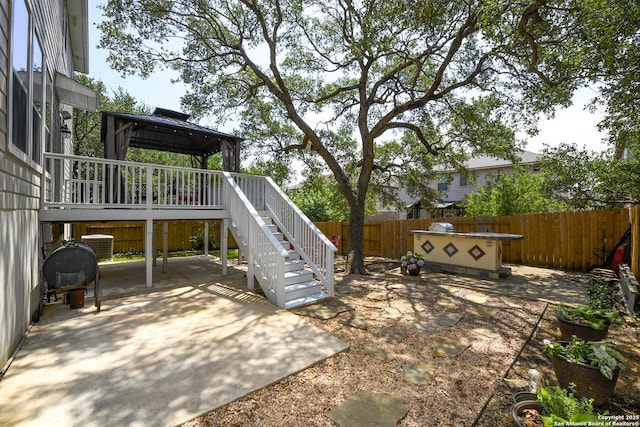 414 Aspen, San Antonio, TX 78253 - fenced backyard with a gazebo, stairs, and a patio