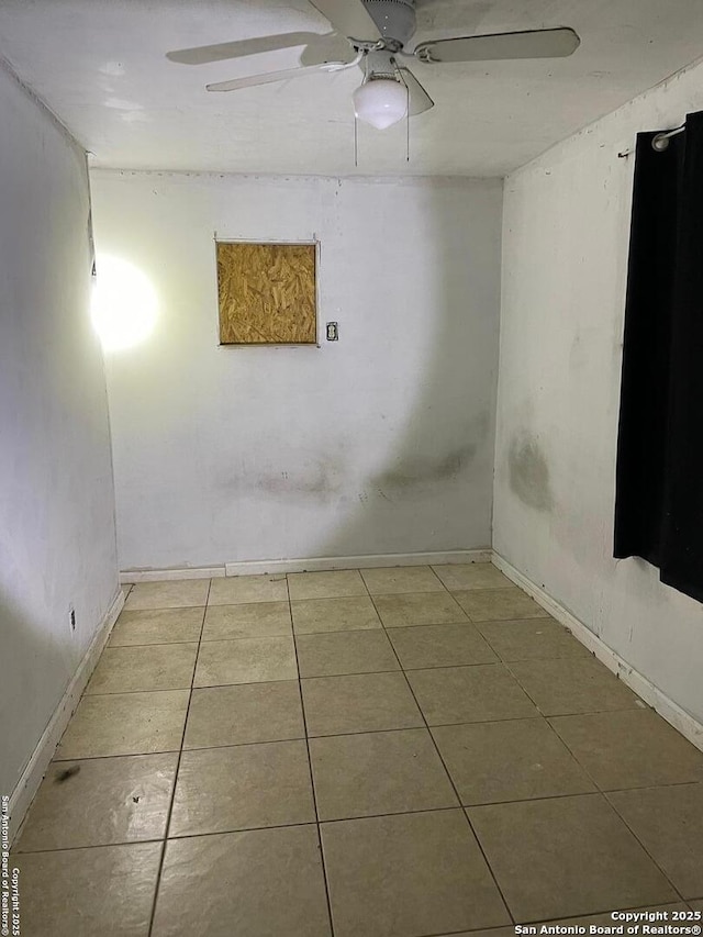 439 W Lubbock St, San Antonio, TX 78204 - unfurnished room featuring a ceiling fan, tile patterned floors, and baseboards