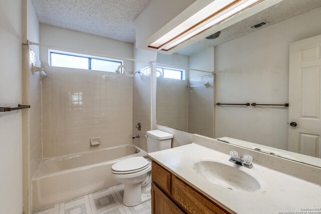 15314 Artesian Oaks, San Antonio, TX 78232 - full bath with washtub / shower combination, toilet, vanity, and a textured ceiling