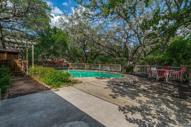 15314 Artesian Oaks, San Antonio, TX 78232 - view of pool featuring view of wooded area and a patio area