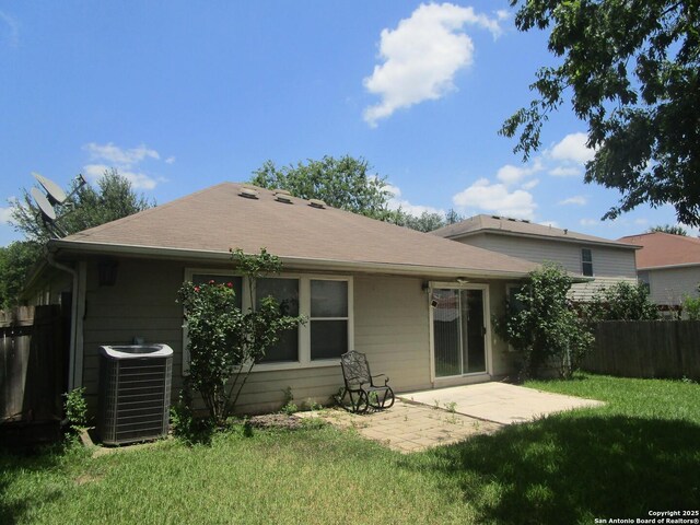 11011 Crystal Pln, Live Oak, TX 78233 - rear view of house with cooling unit and a patio area