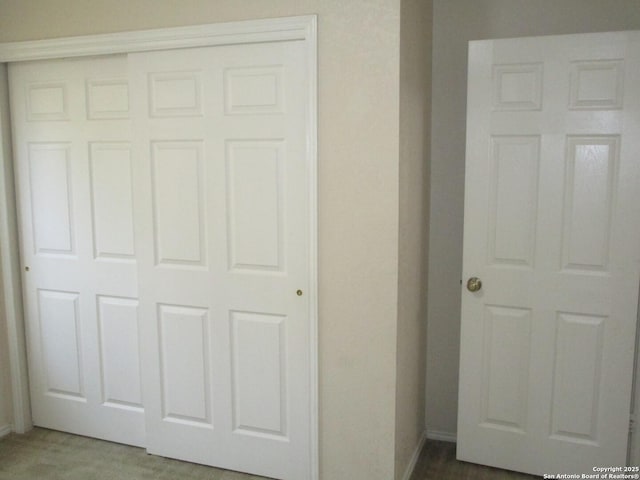 11011 Crystal Pln, Live Oak, TX 78233 - unfurnished bedroom featuring a closet and baseboards