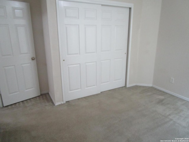 11011 Crystal Pln, Live Oak, TX 78233 - unfurnished bedroom with carpet flooring, baseboards, and a closet
