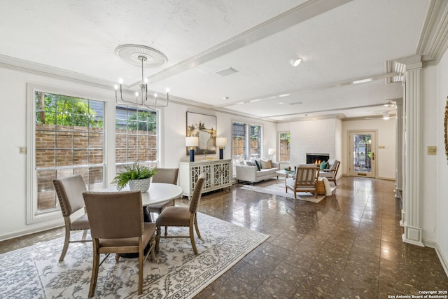 209 Chichester Pl Unit 1, San Antonio, TX 78209 - dining area featuring plenty of natural light, crown molding, baseboards, and a chandelier