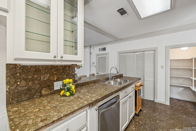 209 Chichester Pl Unit 1, San Antonio, TX 78209 - kitchen with stainless steel dishwasher, a sink, white cabinets, glass insert cabinets, and decorative backsplash
