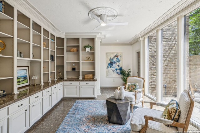 209 Chichester Pl Unit 1, San Antonio, TX 78209 - living area featuring ornamental molding, a ceiling fan, granite floors, and baseboards