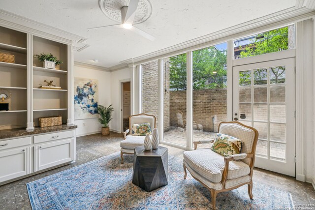 209 Chichester Pl Unit 1, San Antonio, TX 78209 - living area with a ceiling fan, ornamental molding, and baseboards