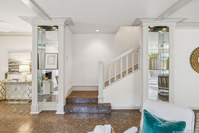 209 Chichester Pl Unit 1, San Antonio, TX 78209 - stairway with a lit fireplace and baseboards