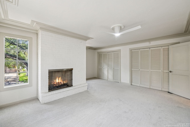 209 Chichester Pl Unit 1, San Antonio, TX 78209 - unfurnished living room with a fireplace, a ceiling fan, carpet flooring, crown molding, and baseboards