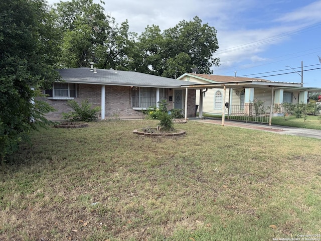 254 W Greenway Ave, San Antonio, TX 78226 - ranch-style home featuring an attached carport, a front yard, covered porch, and brick siding