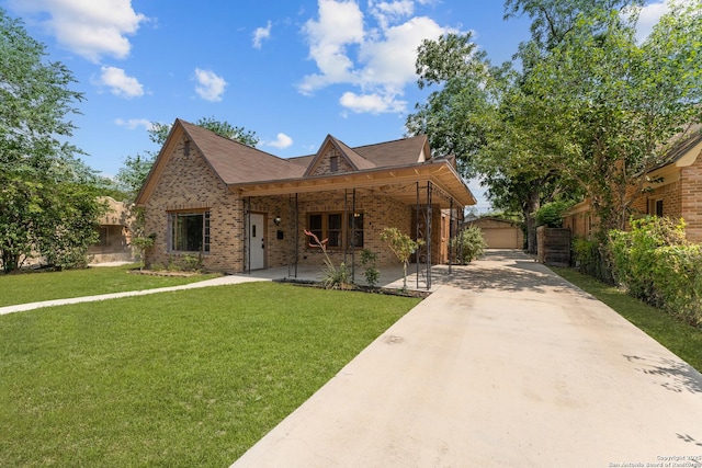 427 Donaldson, San Antonio, TX 78201 - view of front of property with brick siding, concrete driveway, and covered porch