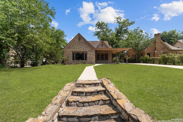 427 Donaldson, San Antonio, TX 78201 - view of front of home featuring a front yard and brick siding