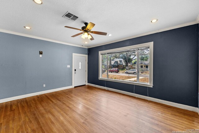 427 Donaldson, San Antonio, TX 78201 - empty room featuring crown molding, a ceiling fan, wood finished floors, baseboards, and recessed lighting