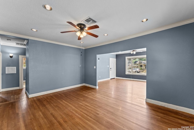 427 Donaldson, San Antonio, TX 78201 - spare room with ceiling fan, wood finished floors, baseboards, ornamental molding, and recessed lighting