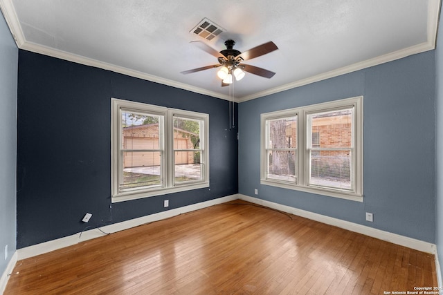 427 Donaldson, San Antonio, TX 78201 - spare room featuring hardwood / wood-style flooring, a ceiling fan, baseboards, and ornamental molding