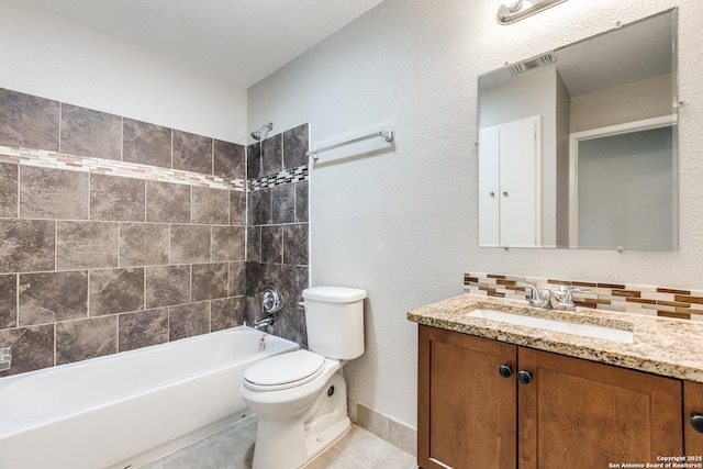 1111 Rio Linda, San Antonio, TX 78245 - bathroom featuring vanity, toilet, shower / bath combination, tile patterned flooring, and decorative backsplash