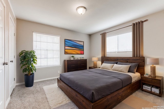 1111 Rio Linda, San Antonio, TX 78245 - bedroom featuring multiple windows, carpet flooring, and baseboards