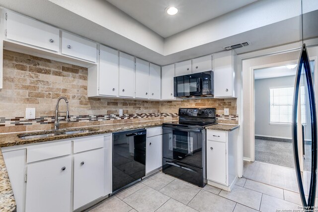 1111 Rio Linda, San Antonio, TX 78245 - kitchen with black appliances, a sink, white cabinetry, light tile patterned floors, and recessed lighting