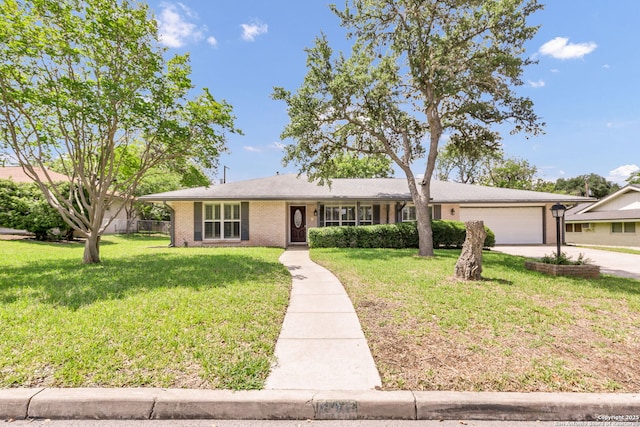634 Golfcrest, Windcrest, TX 78239 - single story home with an attached garage, concrete driveway, and brick siding