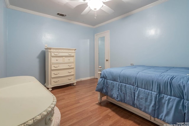 322 Pool, San Antonio, TX 78223 - bedroom featuring light wood-style floors, crown molding, ceiling fan, and baseboards