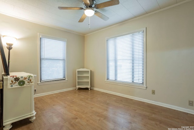 322 Pool, San Antonio, TX 78223 - unfurnished room with wood finished floors, ornamental molding, plenty of natural light, a ceiling fan, and baseboards