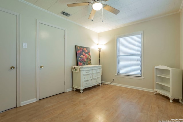 322 Pool, San Antonio, TX 78223 - bedroom featuring ornamental molding, light wood finished floors, ceiling fan, and baseboards
