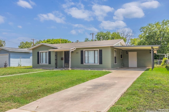 322 Pool, San Antonio, TX 78223 - ranch-style home featuring driveway, a front lawn, and a carport